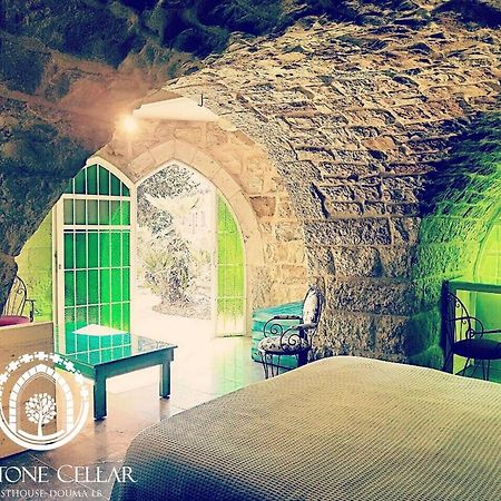 Hotel Stone Cellars à Douma Extérieur photo