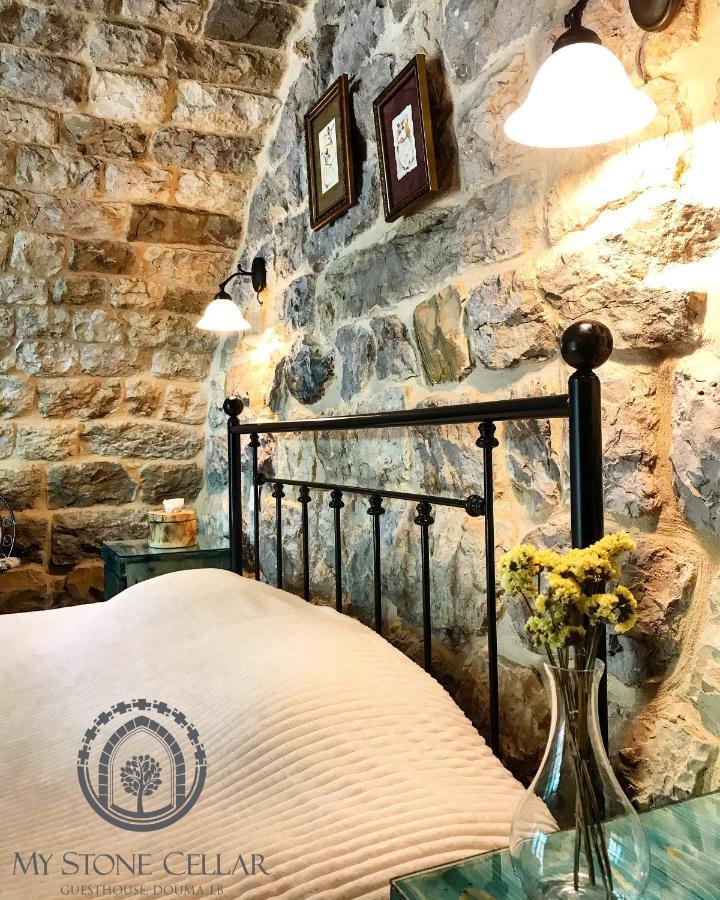 Hotel Stone Cellars à Douma Extérieur photo