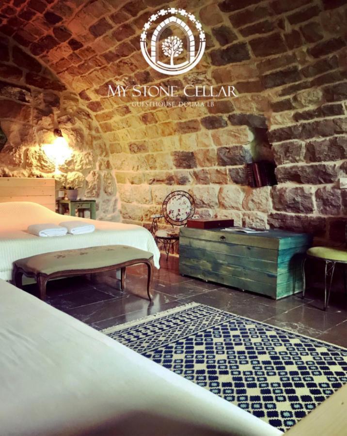 Hotel Stone Cellars à Douma Extérieur photo