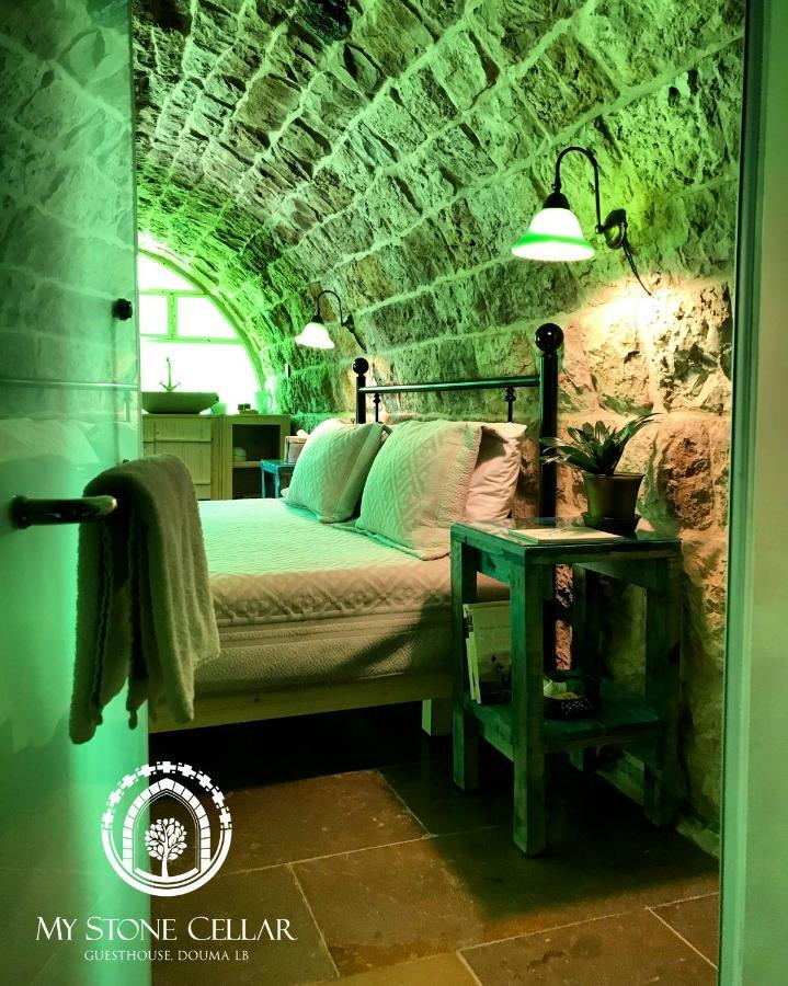 Hotel Stone Cellars à Douma Extérieur photo