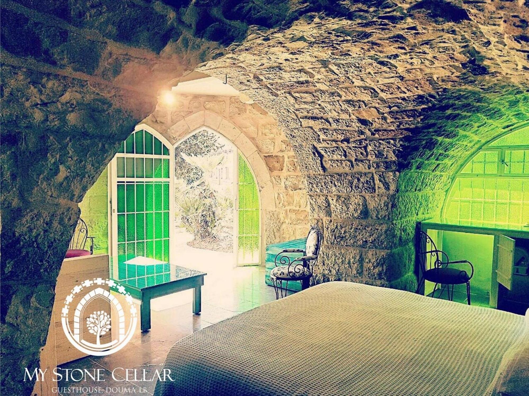 Hotel Stone Cellars à Douma Extérieur photo